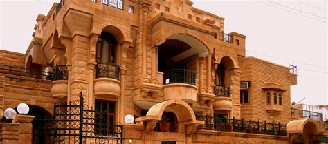 typical pink stone house  arches  rajasthan india house  design stone house