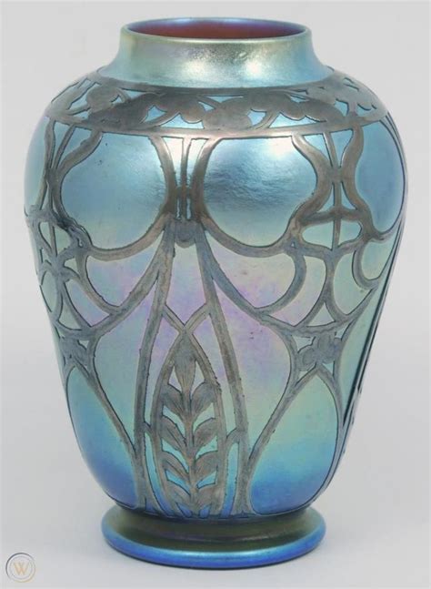 Loetz Bohemian Hand Blown Art Glass Vase Having A Blue Iridescent Tone