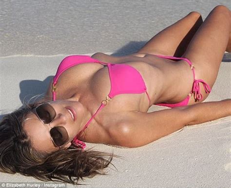 elizabeth hurley flaunts ample assets in skimpy bikini