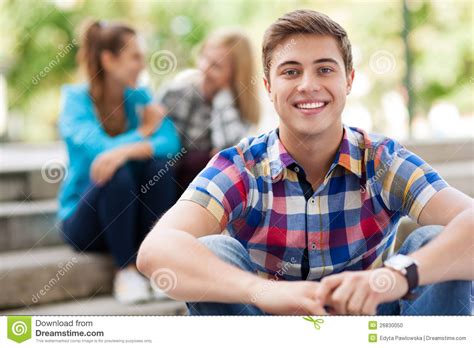 young man  friends  background stock photo image  cheerful