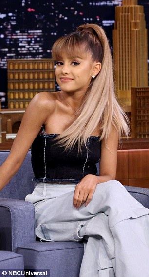 ariana grande trades one sultry crop top for another on the tonight