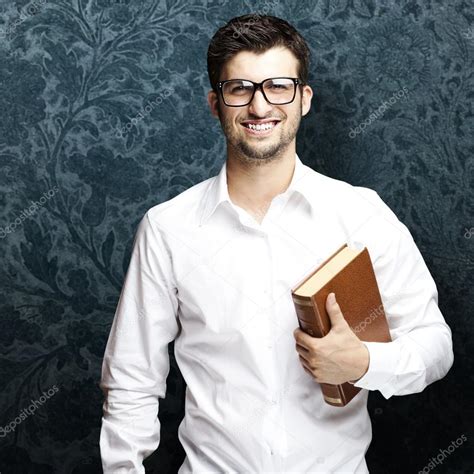 depositphotos stock photo man holding book catholic life coach
