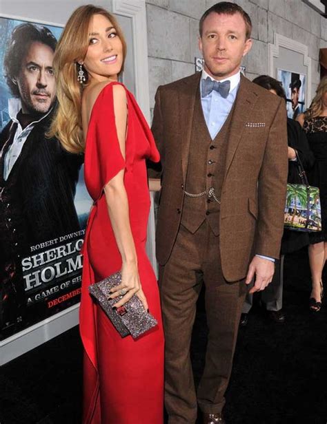 guy ritchie looks almost as dapper as girlfriend jacqui