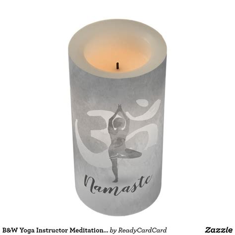 bw yoga instructor meditation tree pose om symbol flameless candle