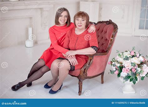 Mature Mother And Daughter Hugging Stock Image Image Of House