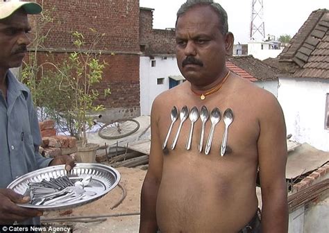 indian man who claims to be magnetic can hold a 10kg iron on his body