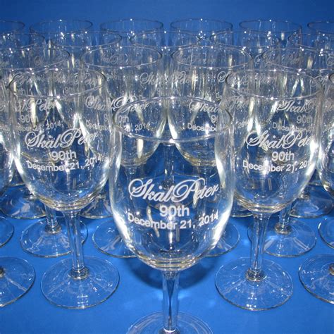 a pair of wine glasses etched and personalized by you