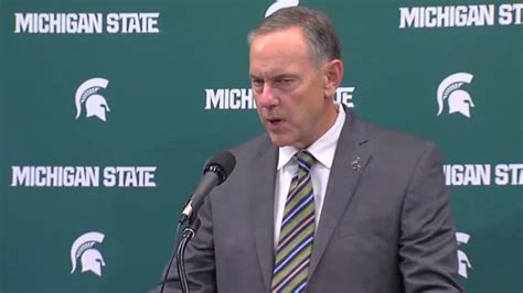 michigan state football coach says he will not resign following espn