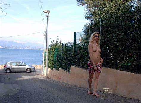 Topless And Flashing On A Side Street Near Traffic And The Ocean