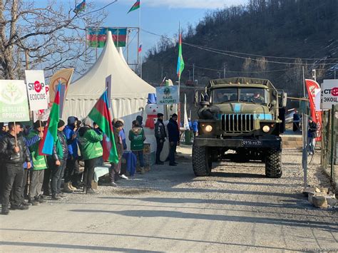 vehicles  russian peacekeepers pass freely  azerbaijans lachin khankendi road