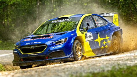 subaru wrx rally car debuts  travis pastrana  team