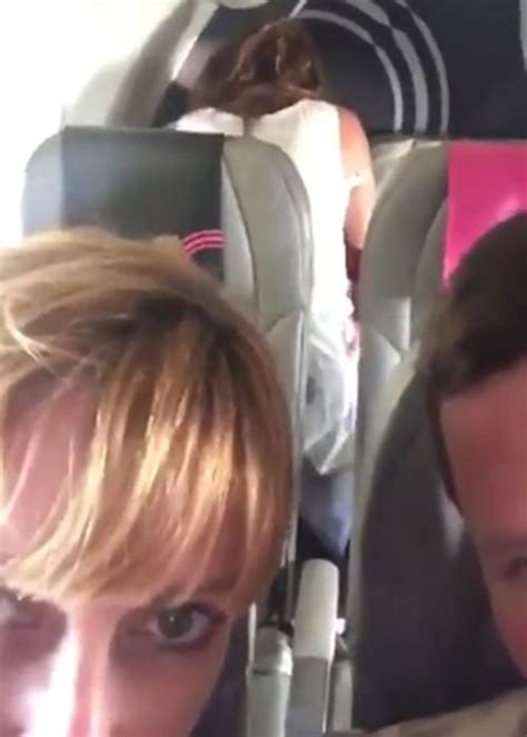 couple caught having steamy romp on plane while in their seats