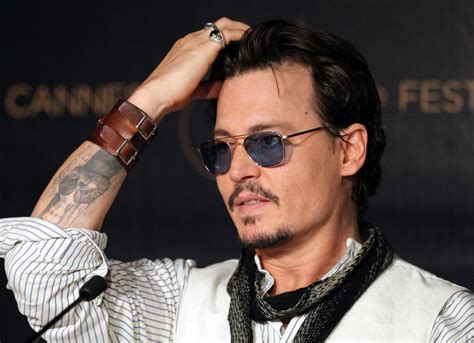 tattoos  johnny depp    sun