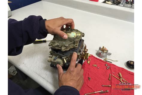 throwback thursday rebuilding  quadrajet carburetor