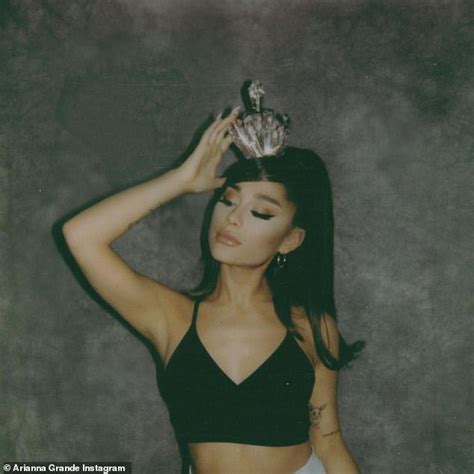 Ariana Grande Dazzles In Black Sports Bra As She Promotes Her Newly