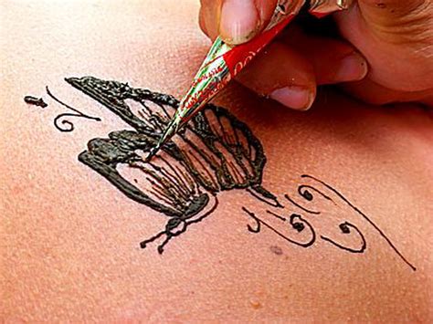 femmes papilion tatouage gae imagenes
