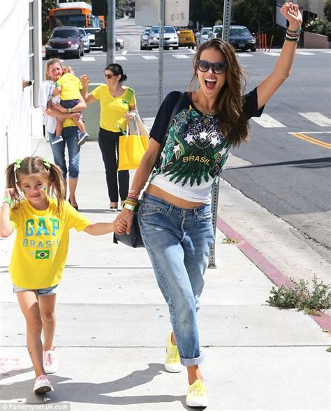 alessandra ambrosio dons brazil jersey at world cup party