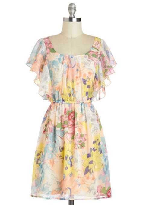 7 beautifully breezy summer dresses under 50 to add to