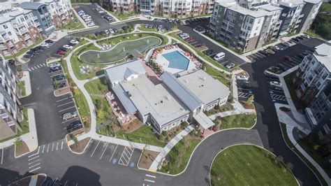 callahan completes elevation apartments  crown colony high profile