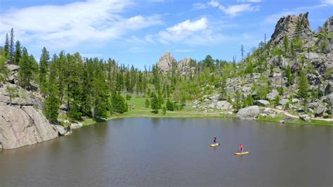 aerial drone view paddleboarders  custer state park youtube