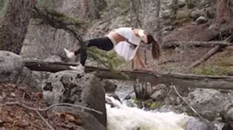 woman attempts yoga pose   fallen tree  result