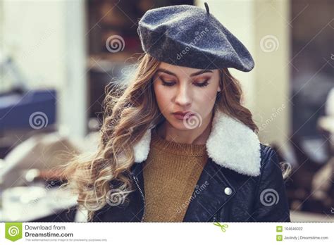 Beautiful Blonde Russian Woman In Urban Background Stock