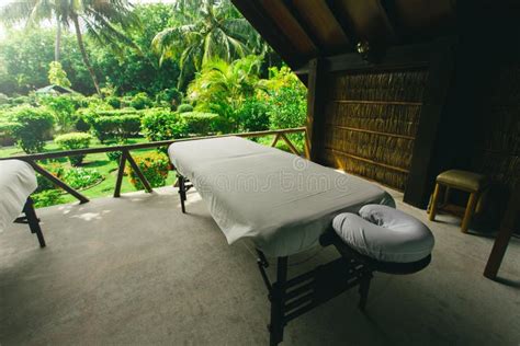 spa beds ready  massage  outdoors tropical island stock photo