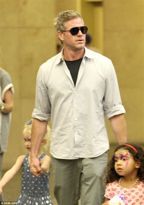 sunglasses clad eric dane takes his little princess to a disney party daily mail online