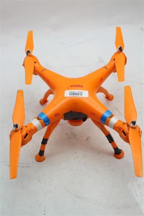 syma quadcopter drone orange property room