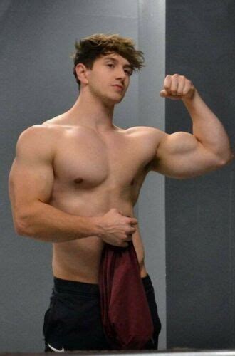 shirtless male muscular gym jock hunk flexing bicep bare chest photo