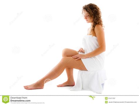Woman Wrapped In Towel Sitting On White Background Royalty