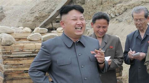 Kim Jong Un Smoking Reading The Pictures