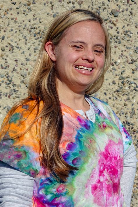 Woman With Downs Syndrome Photographs Others With The Condition In A