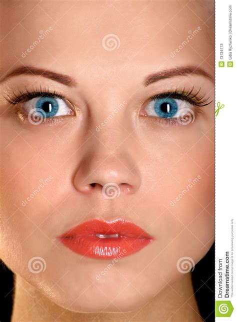 the face of the beautiful girl with blue eyes stock image