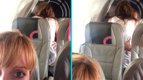 mile high club couple filmed having sex on plane in full view of my