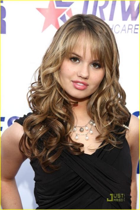 long curly brown hairstyles for teen girl from debby ryan