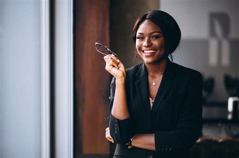 photo african american business woman   window