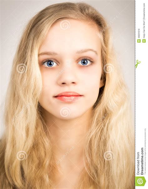 beautiful blond teenage girl looking in the camera stock image image 49031619