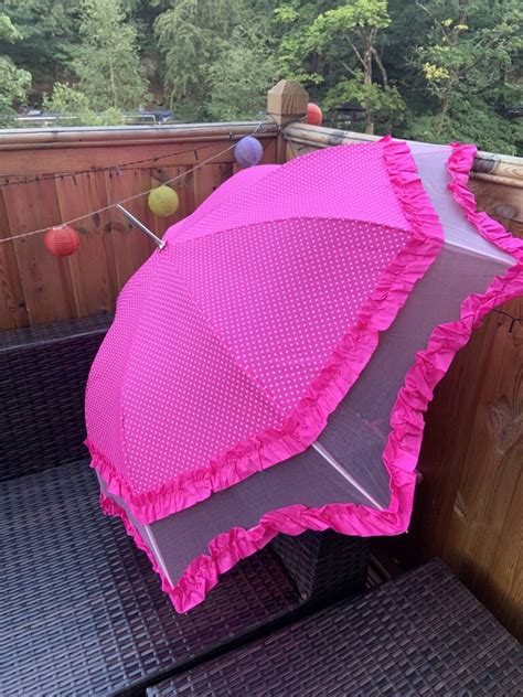 pink spotted parasol  umbrellabella notonthehighstreetcom