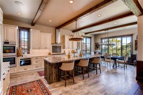 rustic open concept kitchen  white cabinets  granite counter tops open concept kitchen