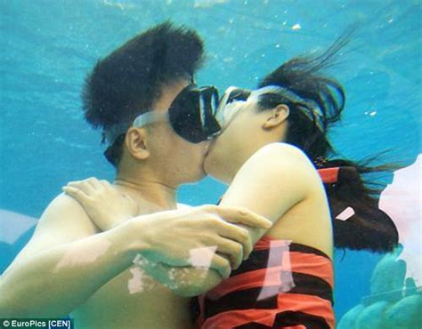 International Kissing Day Celebrated By Couples Kissing For Underwater