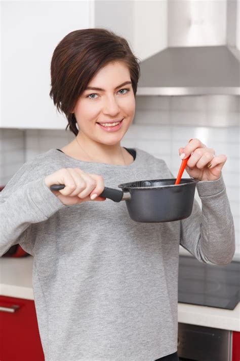 Brunette With Saucepan At Kitchen Stock Image Image Of Kitchen