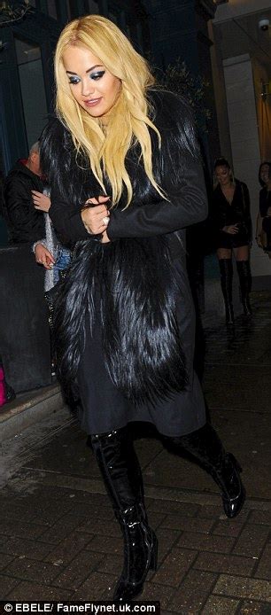 Rita Ora Debuts Yellow Locks As She Hits London In Pvc Thigh High Boots
