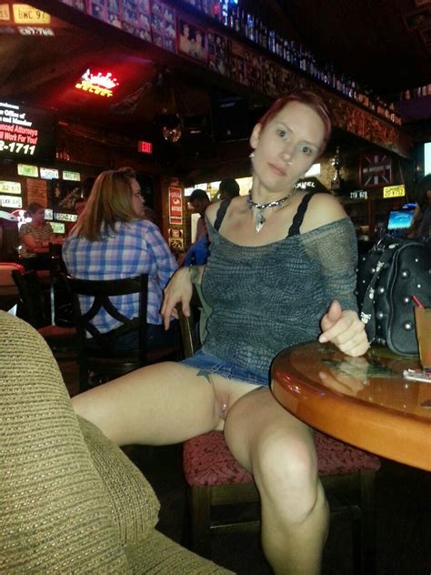 mature woman flashing shaved pussy at public bar voyeur pictures