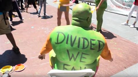 protesters take a naked stand against ‘divisiveness in times square