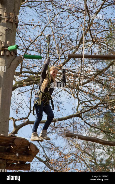 Berlin Germany A Girl In High Ropes Course In The Virgin Heath Stock