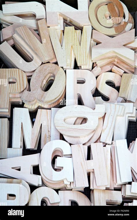 alphabet letters carved  wood stock photo alamy