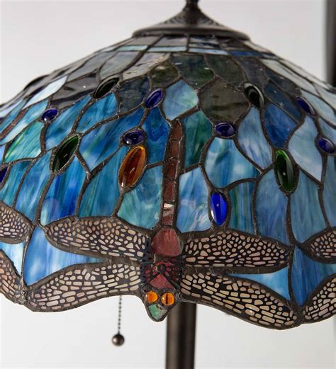tiffany style stained glass floor lamp with dragonfly motif and metal
