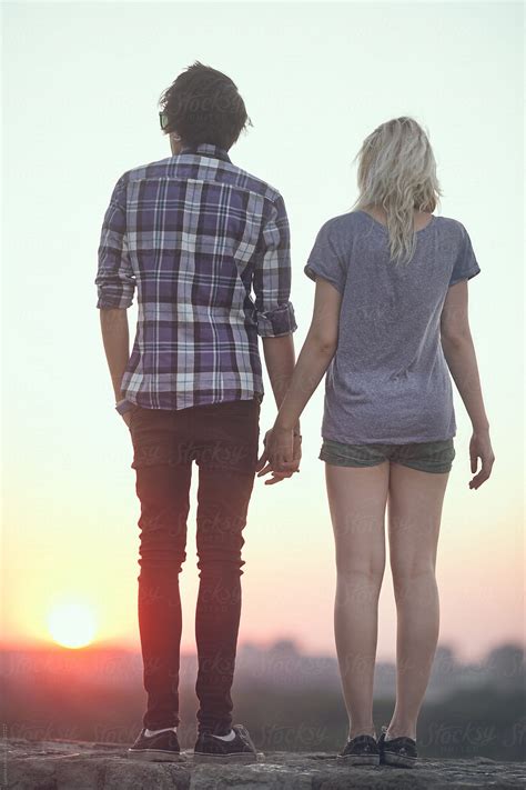 Teenage Couple Holding Hands By Stocksy Contributor Lumina Stocksy