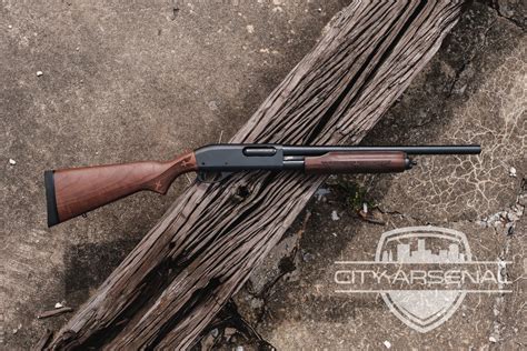 remington  pump action shotgun ga  barrel hardwood stock blued finish